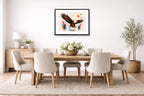 Geometric Painting of an Eagle Landing printed on fine art paper, framed on a black frame and matted and hung on a dining room wall.