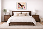 Geometric Painting of an Eagle Catching a Fish printed on canvas wall art displayed on a wall above a bed.