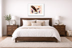 Geometric Painting of an Eagle Catching a Fish printed on fine art paper, framed on a white frame and matted. Hung on a bedroom room wall