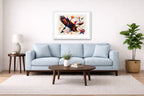 Eagle Painting with Geometric Background printed on fine art paper, framed on a white frame and matted. Hung on a living room wall.