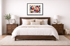 Geometric Fox Painting printed on fine art paper, framed on a black frame and matted and hung on a wall on an bedroom wall.
