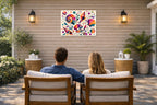 Seashells - Geometric Painting printed on water resistant canvas and mounted on a waterproof frame. Hung on a patio wall with couple.
