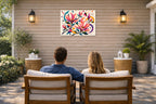 Magnolia Leaves - Geometric Painting printed on water resistant canvas and mounted on a waterproof frame. Hung on a patio wall with couple.