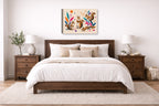 Squirrels at Play - Geometric Painting printed on canvas wall art displayed on a wall above a bed.