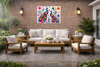 Peacock Pair - Geometric Painting printed on water resistant canvas and mounted on a waterproof frame. Hung on a patio wall.