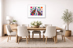 Peacock Pair - Geometric Painting printed on fine art paper, framed on a white frame and matted. Hung on a dining room wall.
