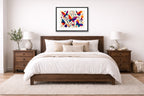 Colorful Butterflies - Abstract Painting printed on fine art paper, framed on a black frame and matted and hung on a wall on an bedroom wall.