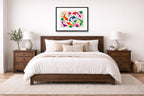 Koi Fish - Geometric Painting printed on fine art paper, framed on a black frame and matted and hung on a wall on an bedroom wall.