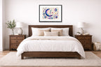 Moon & Stars - Geometric Painting printed on fine art paper, framed on a black frame and matted and hung on a wall on an bedroom wall.