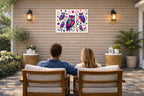 Whimsical Owls - Geometric Painting printed on water resistant canvas and mounted on a waterproof frame. Hung on a patio wall with couple.