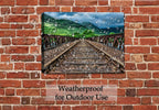 Rails over the River Fine Art Photography on Canvas. Hanging on Brick Patio Wall during a rainstorm.  Waterproof.