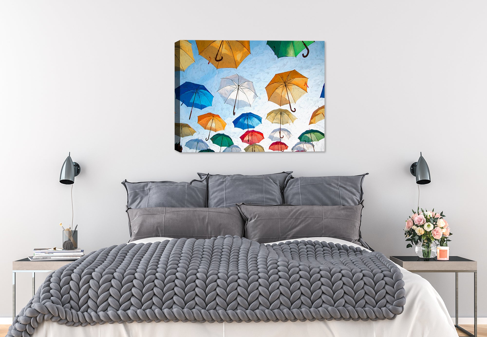 Painting of Multi Colored Umbrellas Floating in the blue Sky - Printed on Canvas - Hanging on a Bedroom Wall.
