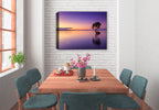 Image of a lone tree in the middle of a purplish colored water and sky.  Printed on Canvas. Hung on a Dining Room Wall. 