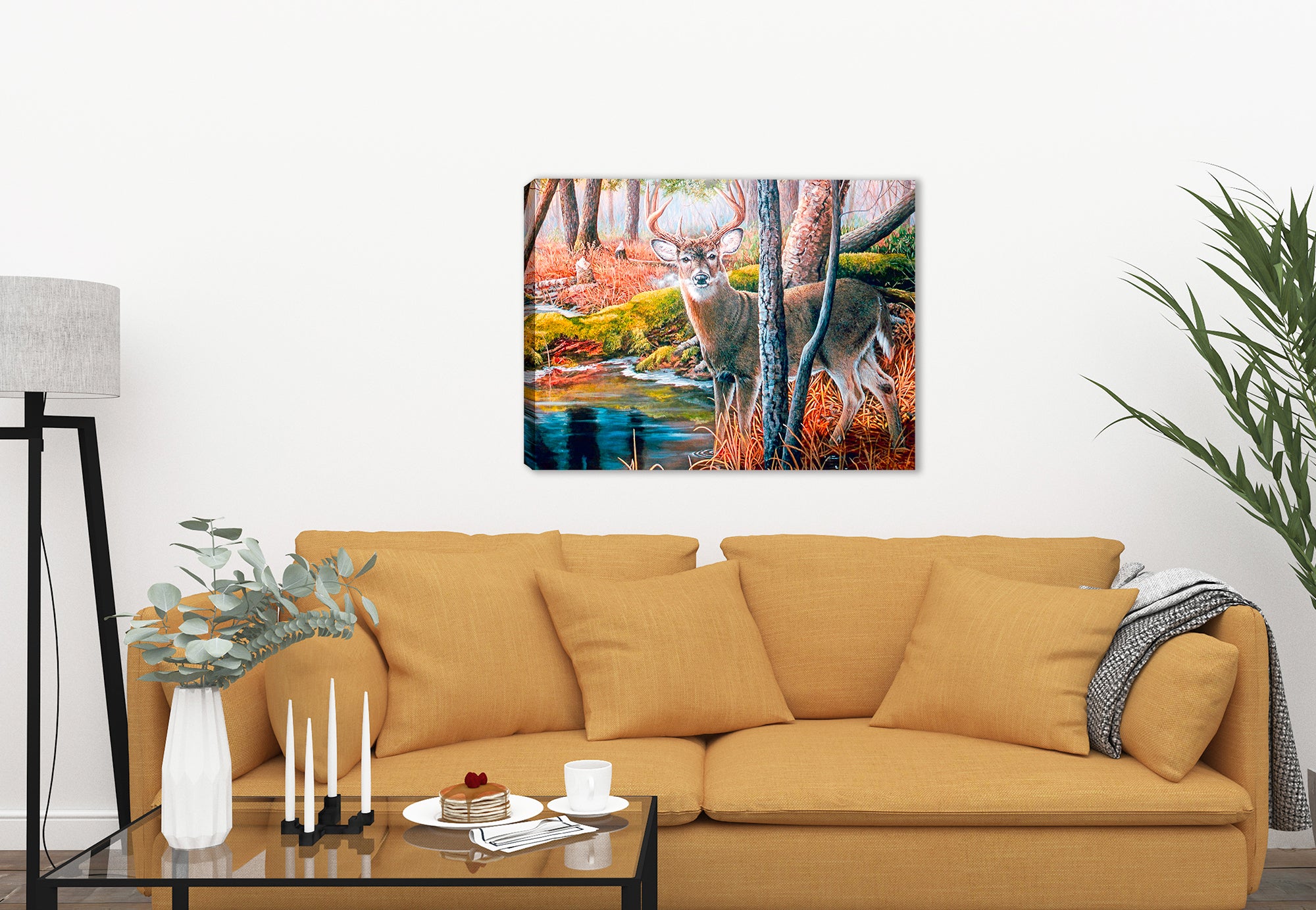 A painting of a deer buck near the Beaver Pond is printed on a canvas wrap hanging on a living room wall.