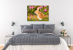 Image of a painting of a rabbit on a Bed of Roses on a canvas wrap hanging on the wall of a bed room