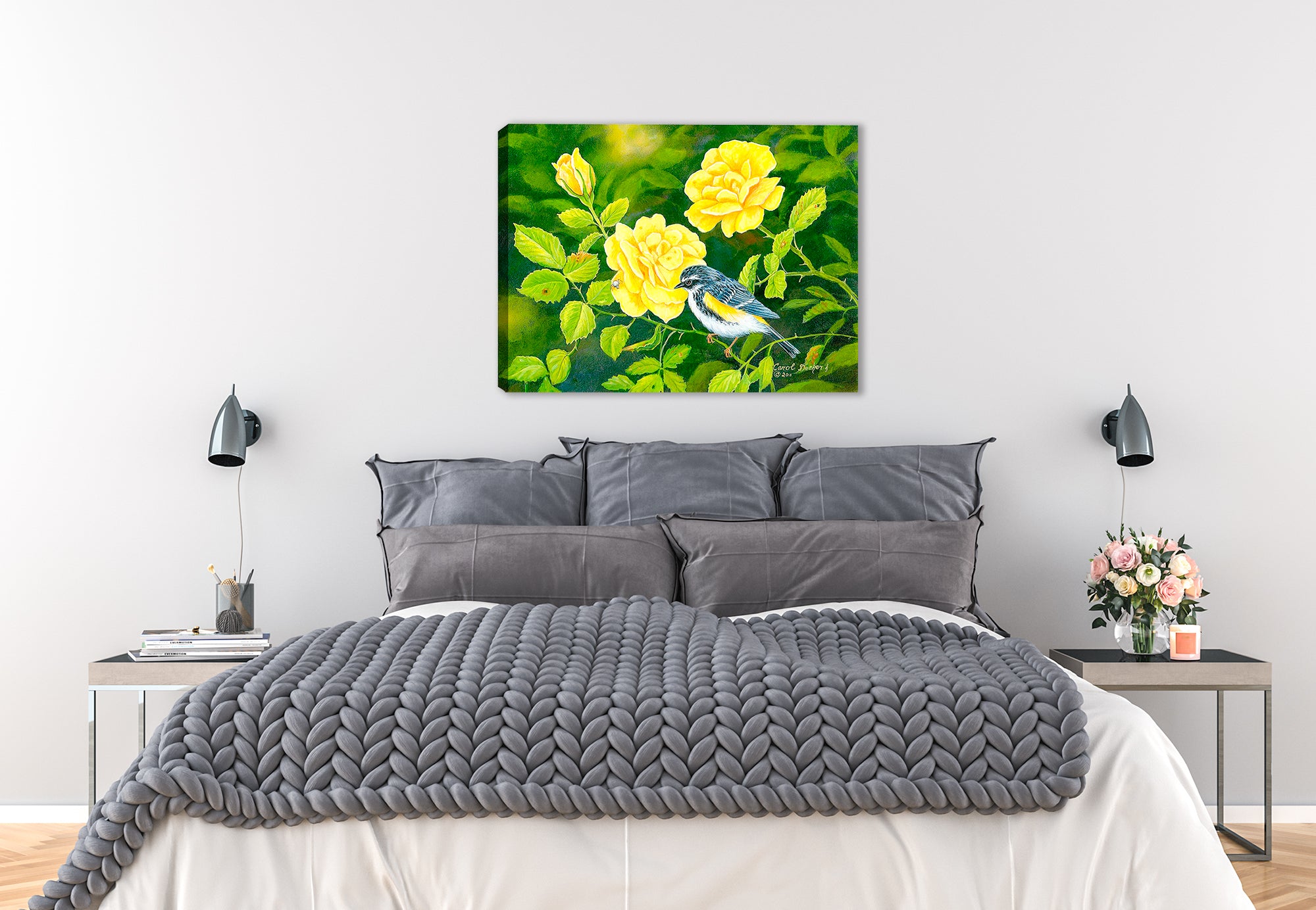 Image of a bird among yellow roses painted on a canvas wrap hanging on the wall of a bedroom.