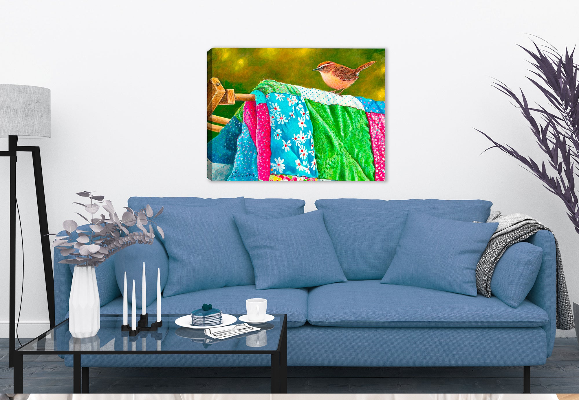 Painting of Bird perched on a Quilt Blanket on a Clothes Line.  Print hanging on Living Room Wall