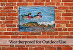 Painting of Wood Ducks swimming in Blue water - Printed on Waterproof Canvas. Hanging on Brick Patio Wall in the Rain.